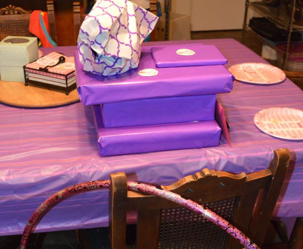 purple wrapped kid's birthday presents 