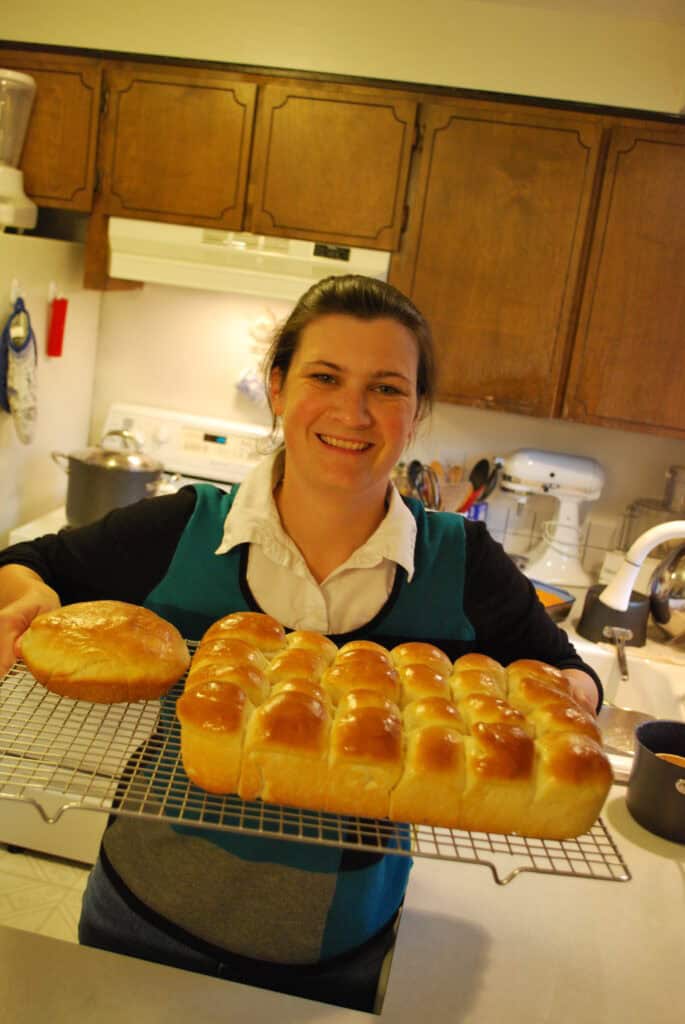 Jenn showing her fresh baked rolls and bread.