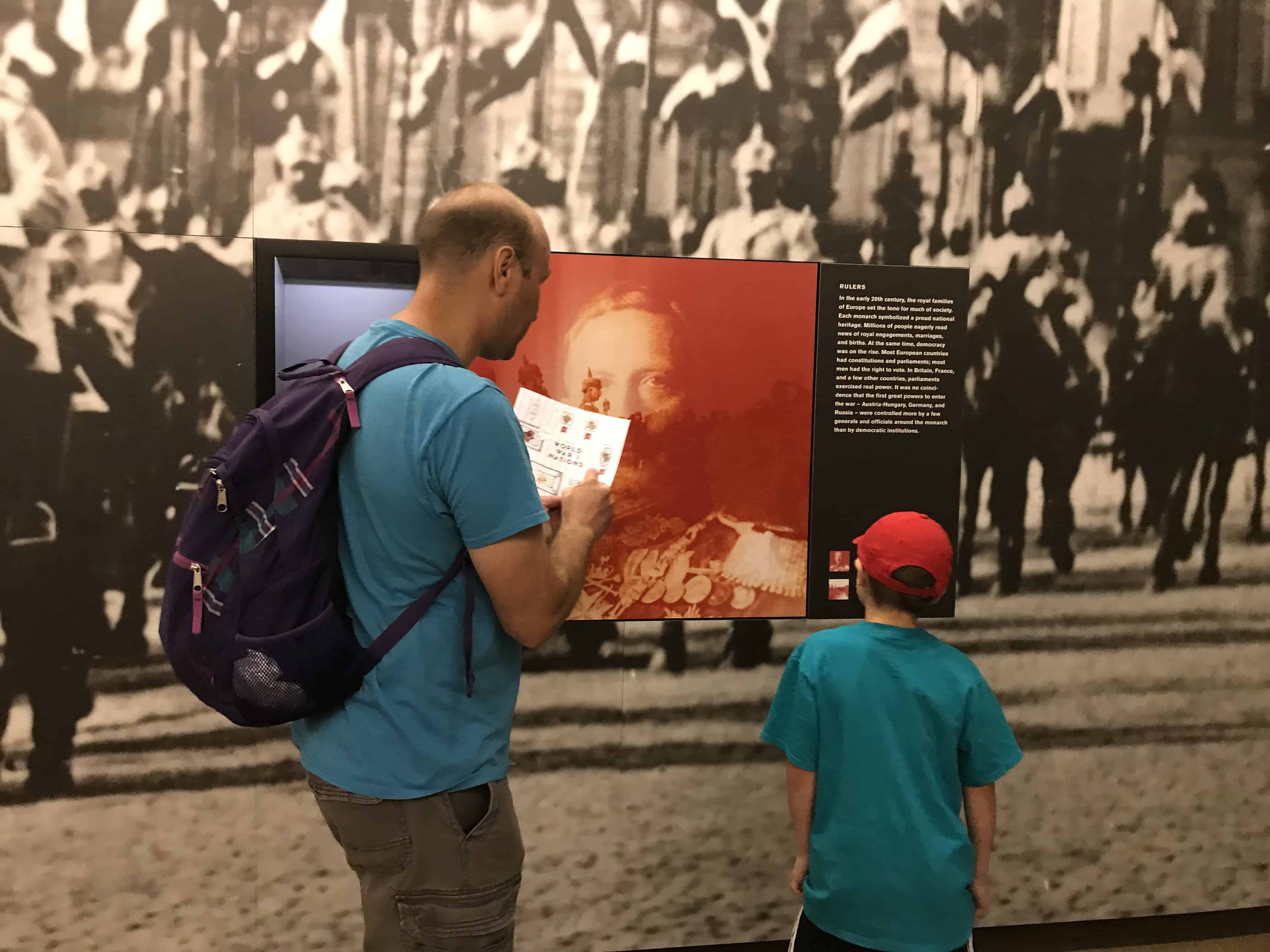 Man and boy looking at exhibit