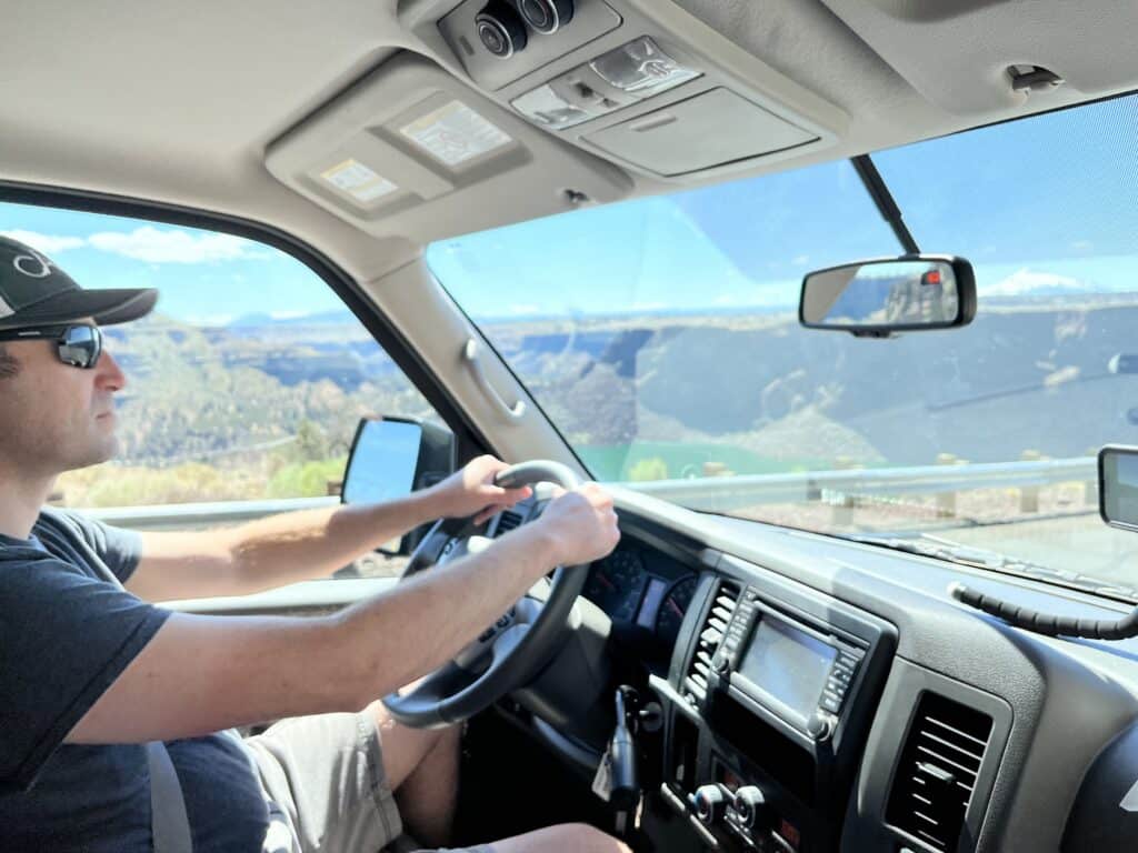 Brian driving on a long trip.