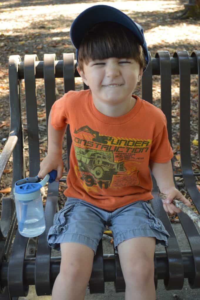 Our son with his trusty stick and water bottle.