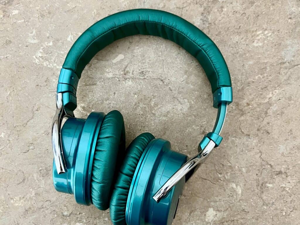Teal green wireless headphones.