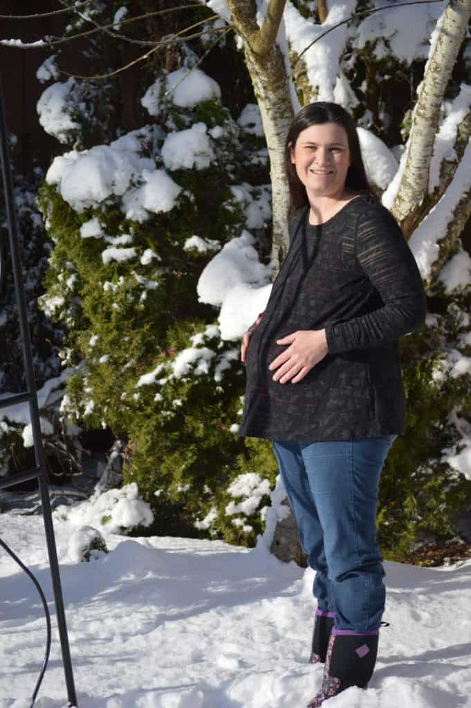 Pregnant woman in snow