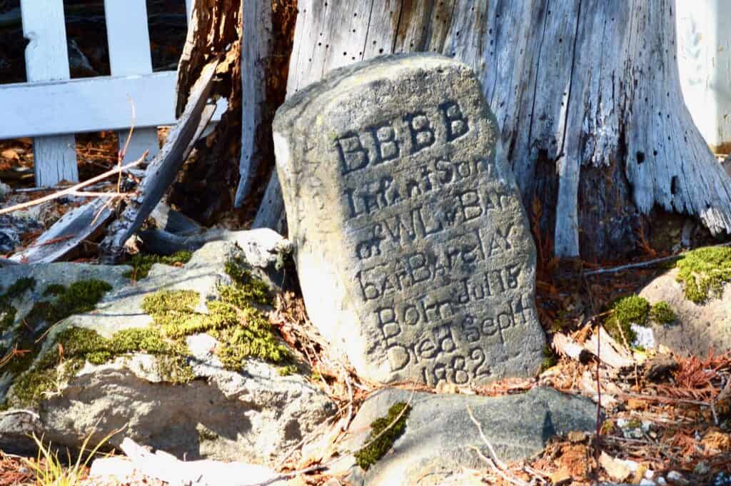 Weathered grave marker for the infant son of WL Barclay from 1882. Located in Summit Meadows near the top of Mt. Hood.