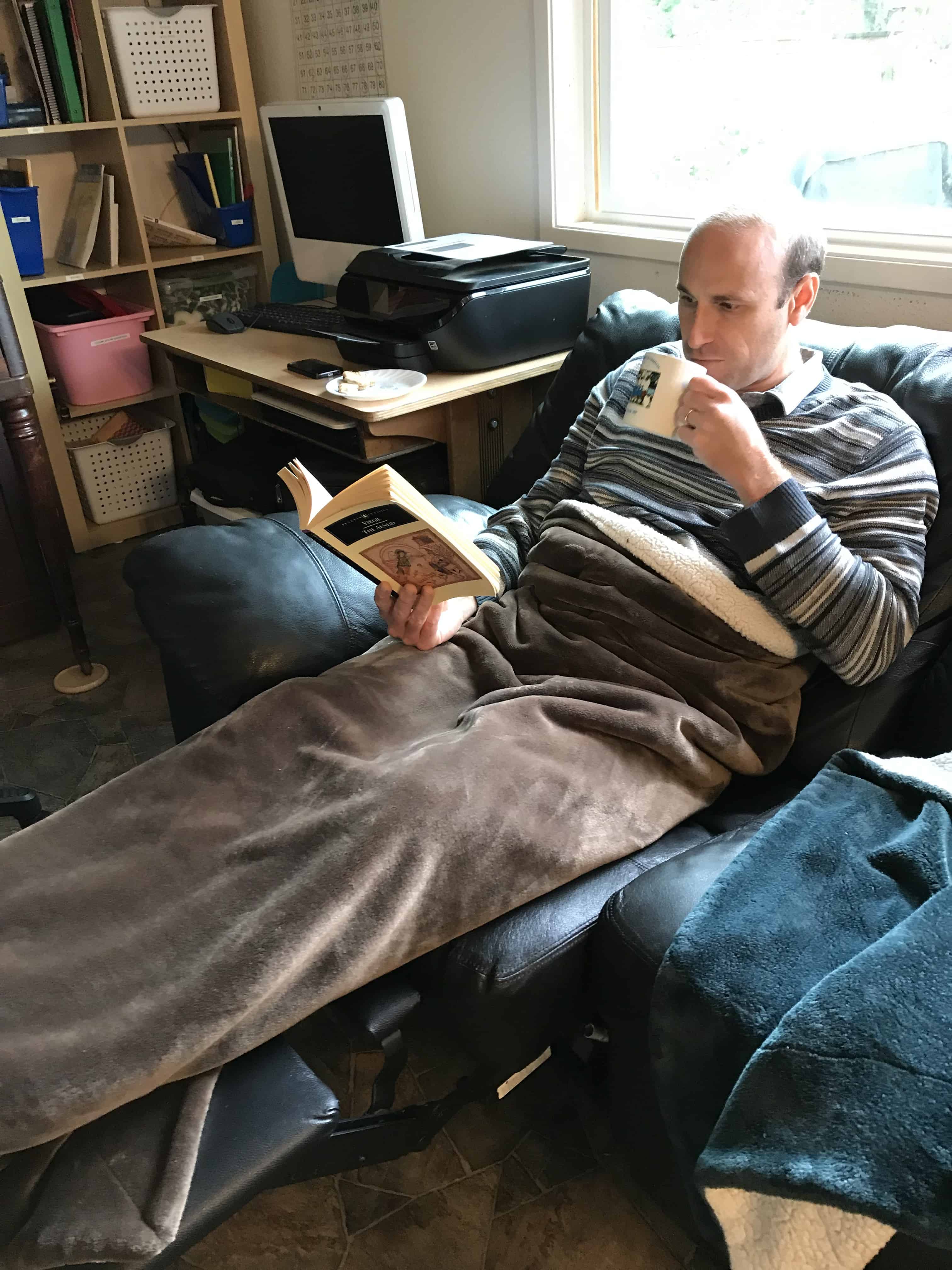man reading book with coffee. 