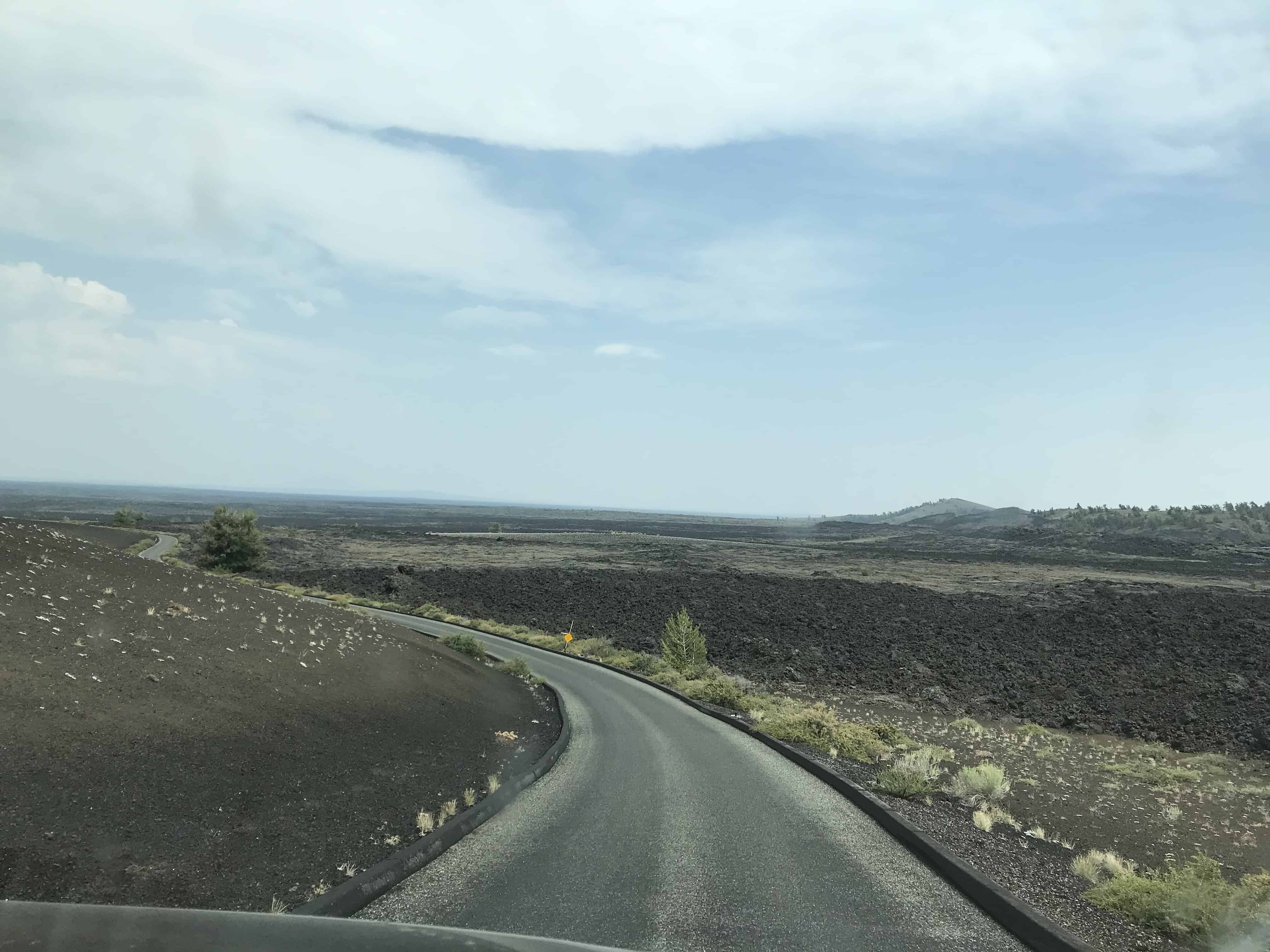 Driving along the Loop road in our van. craters of the moon Idaho with kids
