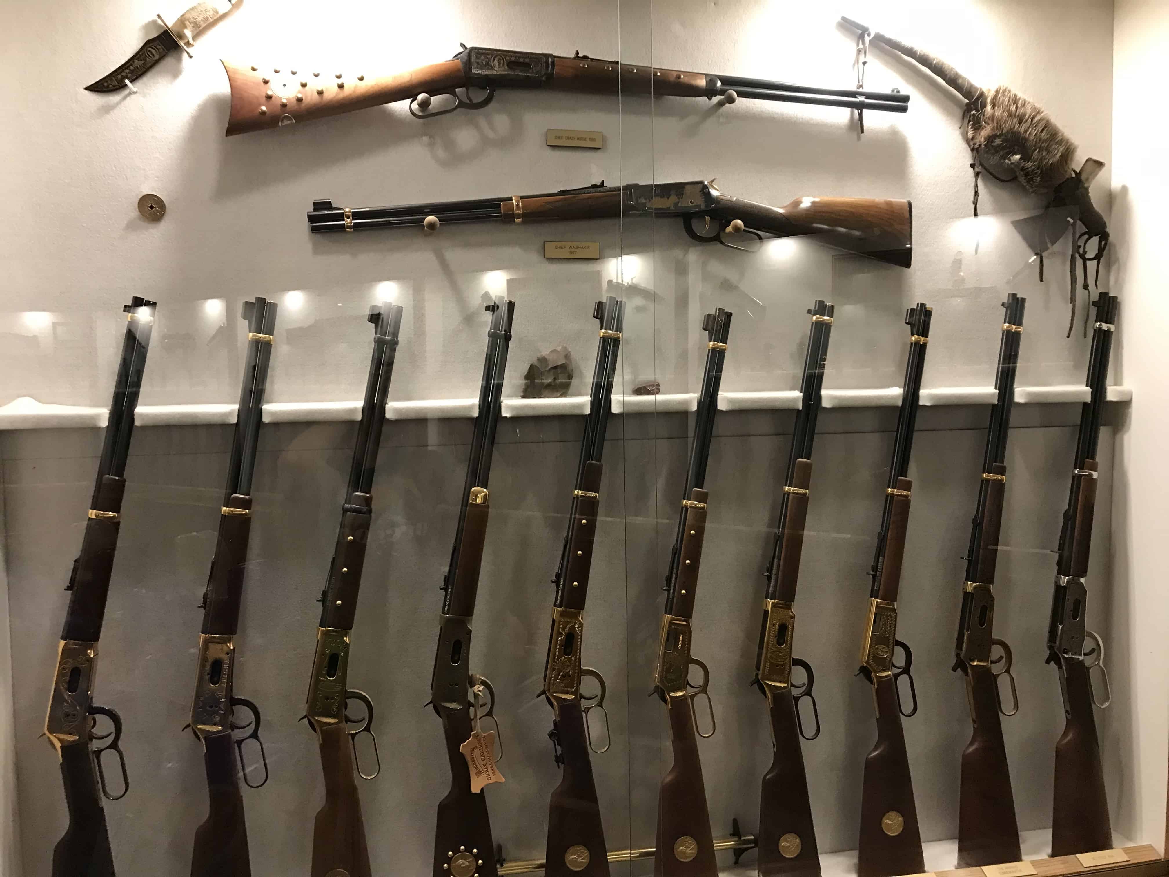 Rifles in glass case. A mountain man would have needed good weapons to survive. This collection is from the Museum of the Mountain Man in Wyoming.