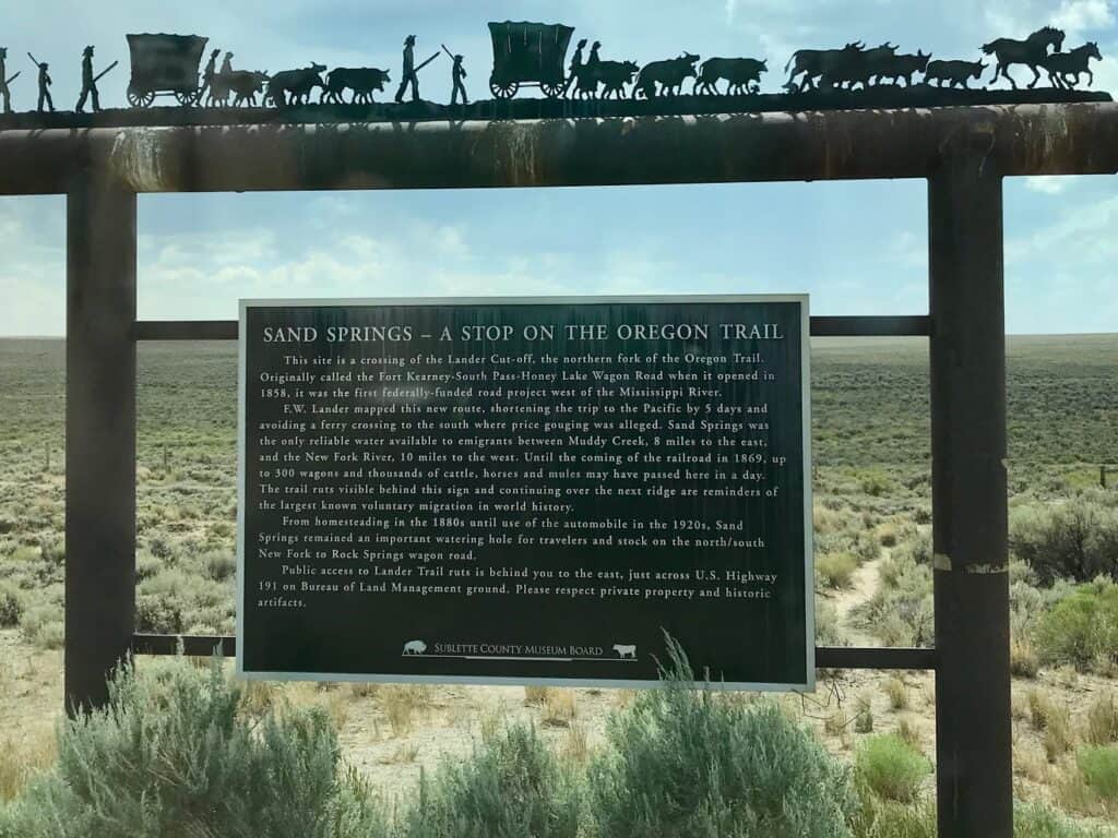 Interpretive sign near Oregon Trail ruts in Wyoming.