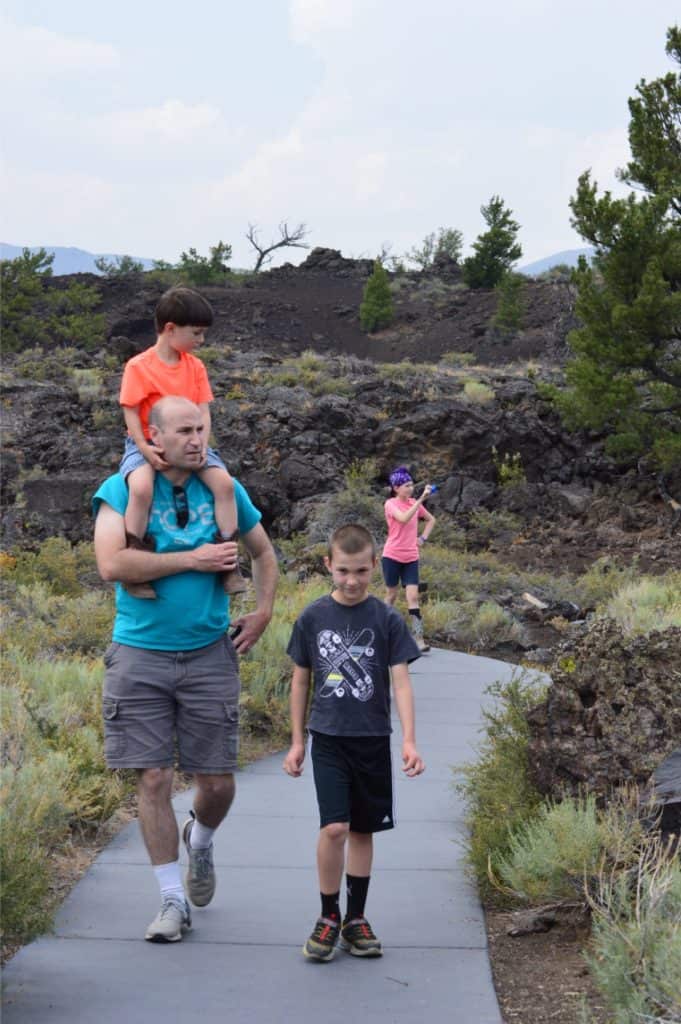 Walking through Devil's Orchard at craters of the moon Idaho with kids.
