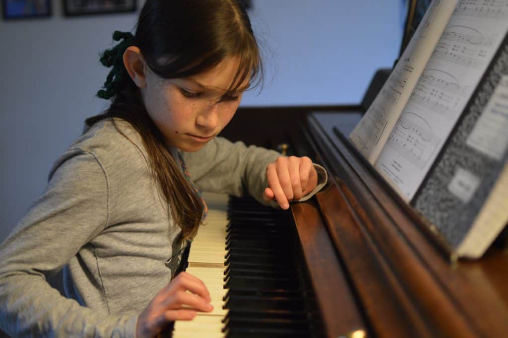 girl at piano