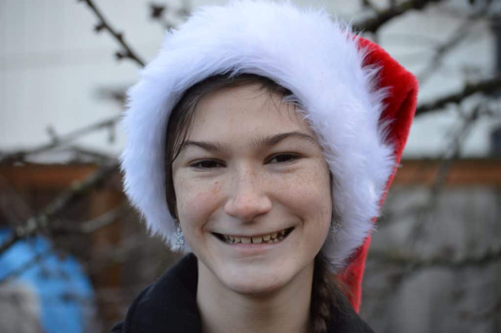 teen girl in Santa hat