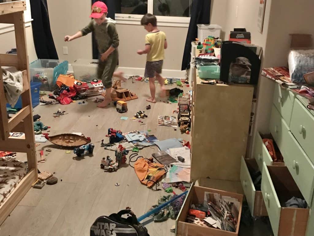 messy bedroom with boys playing