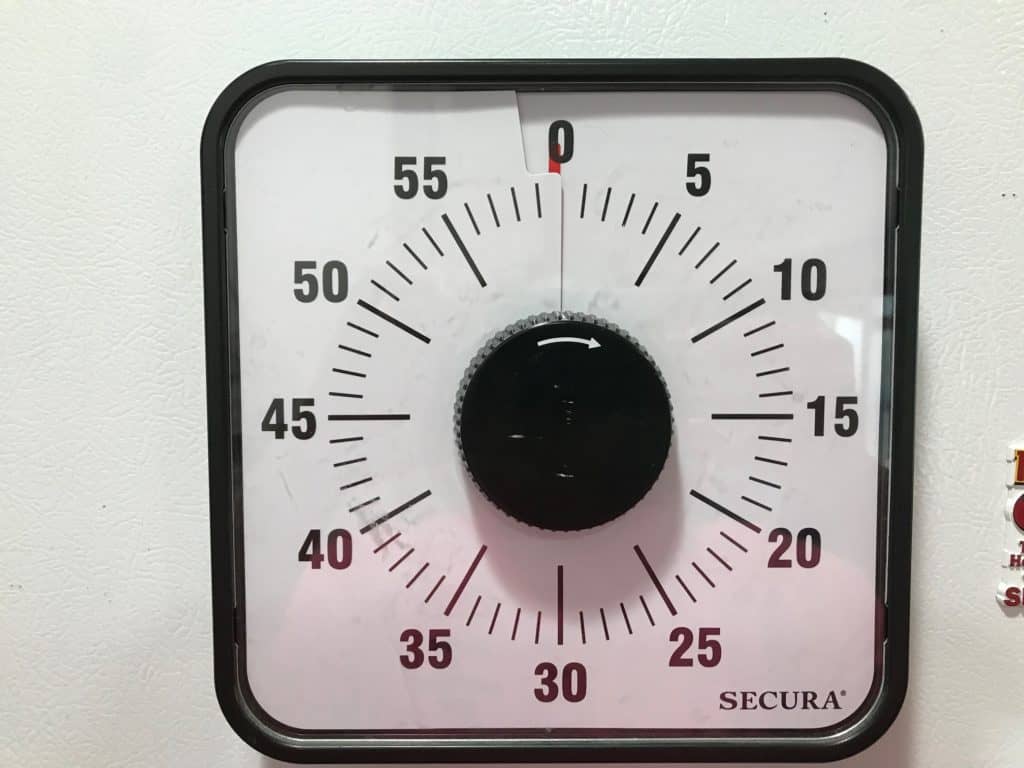 black and white timer on fridge. ADHD timers work best when they can't easily be lost!