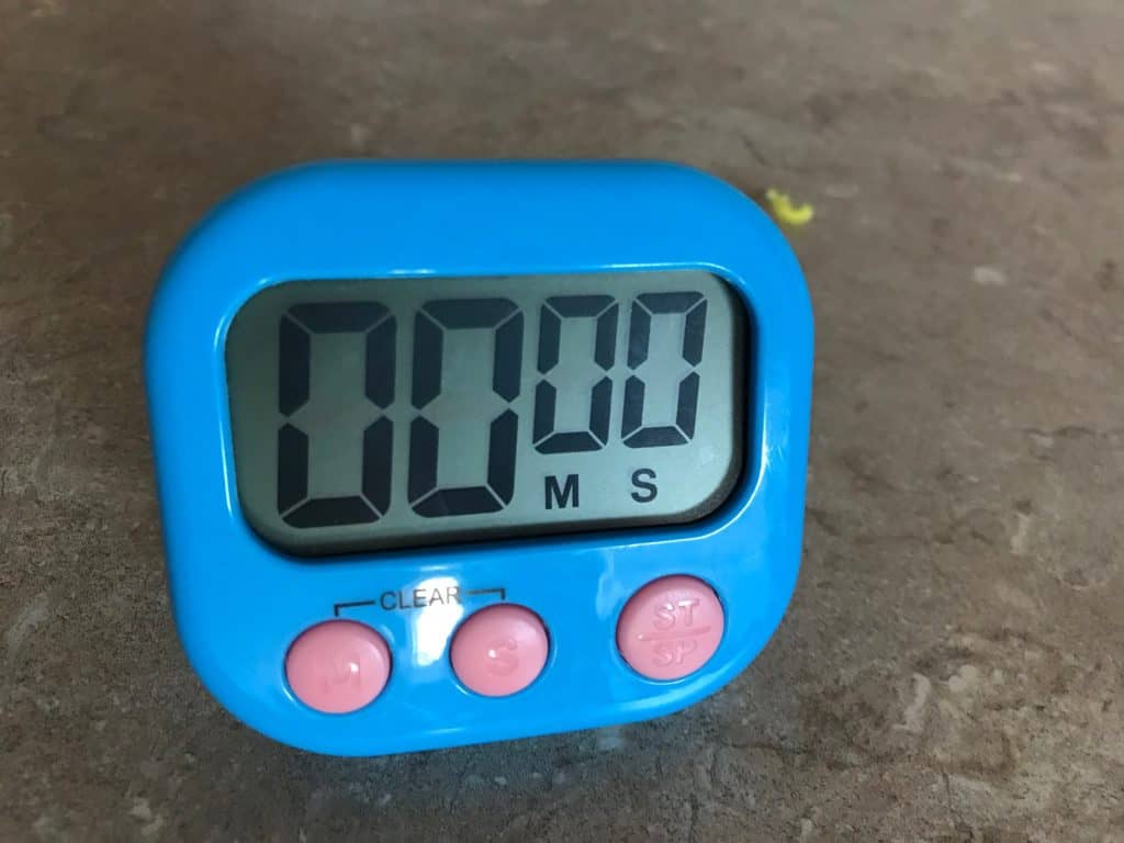 blue digital timer with orange buttons.   Best ADHD timers are colorful and hard to lose.