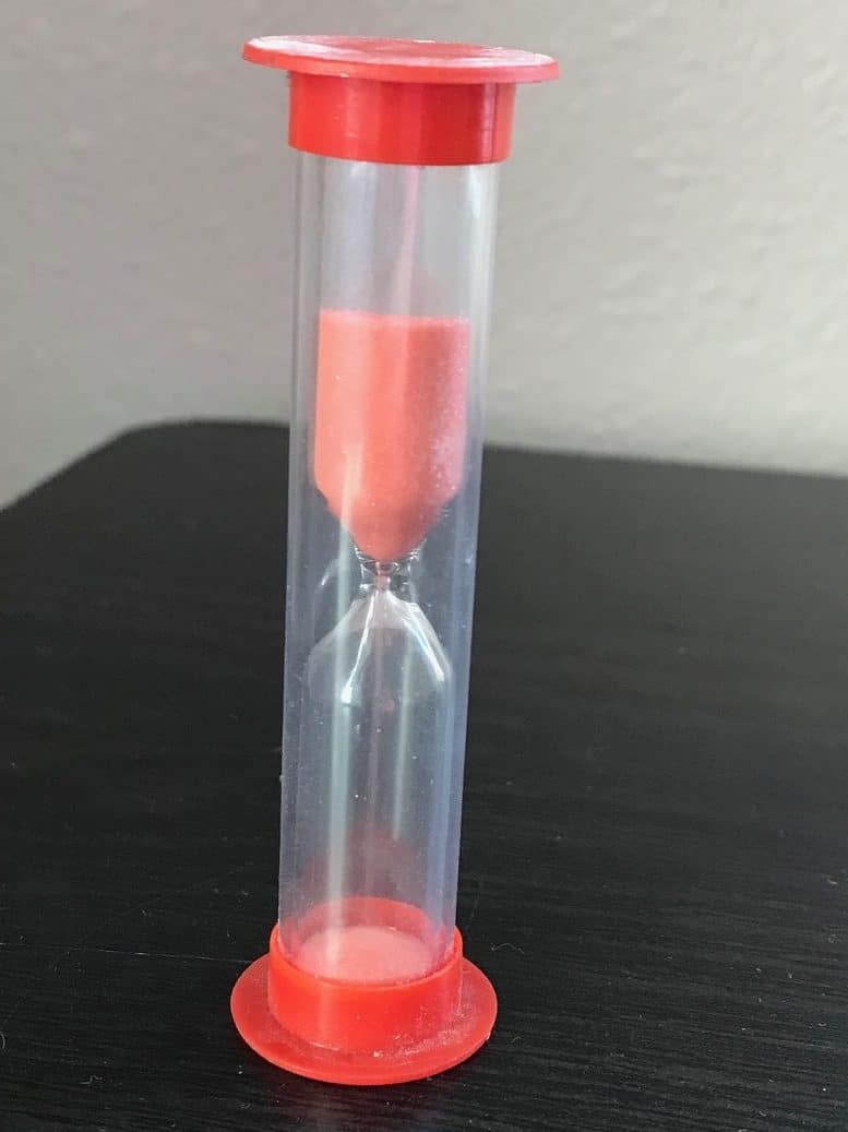 red two minute sand timer. ADHD timers for short tasks can be a great tool!