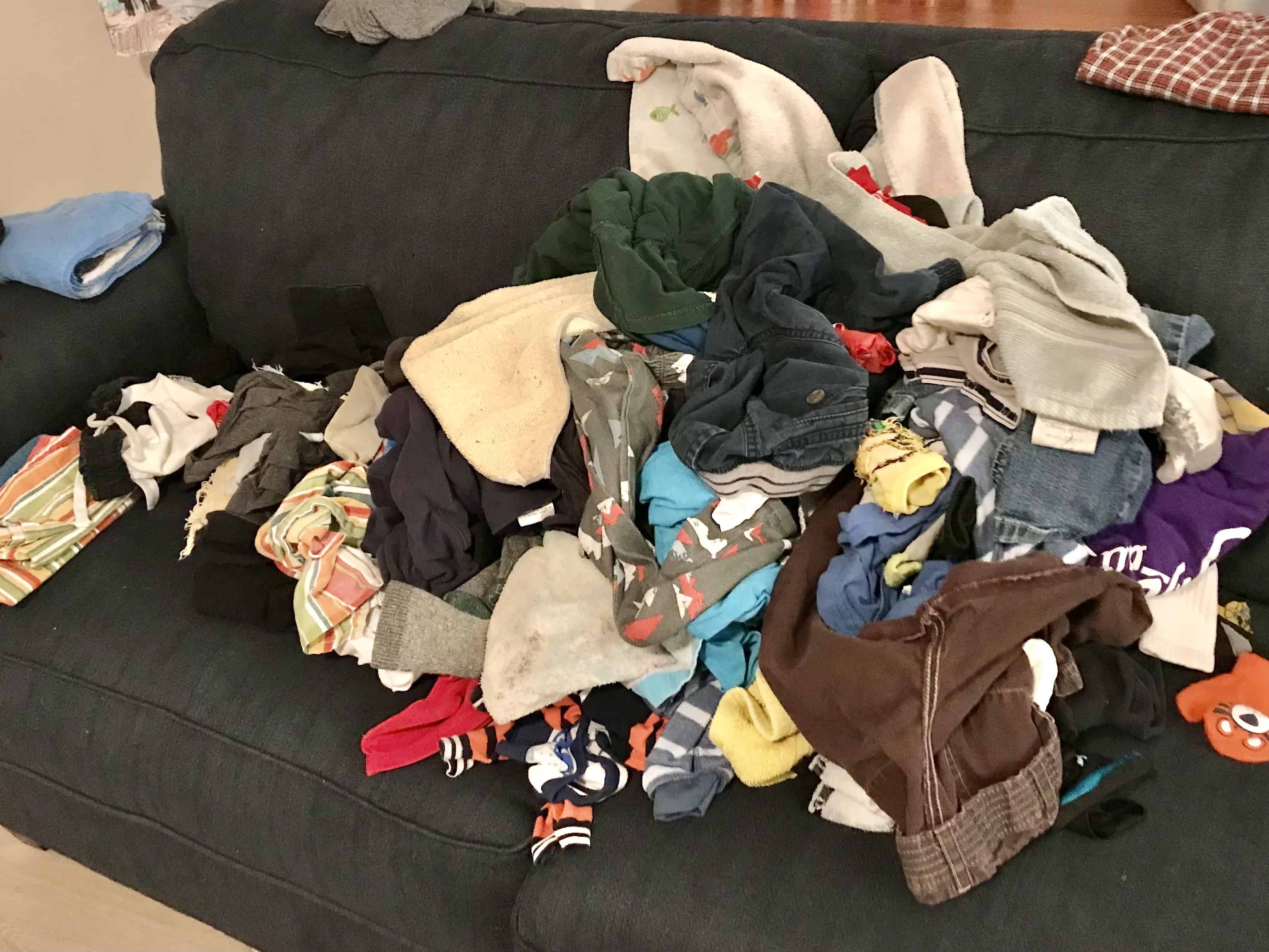 pile of laundry on couch