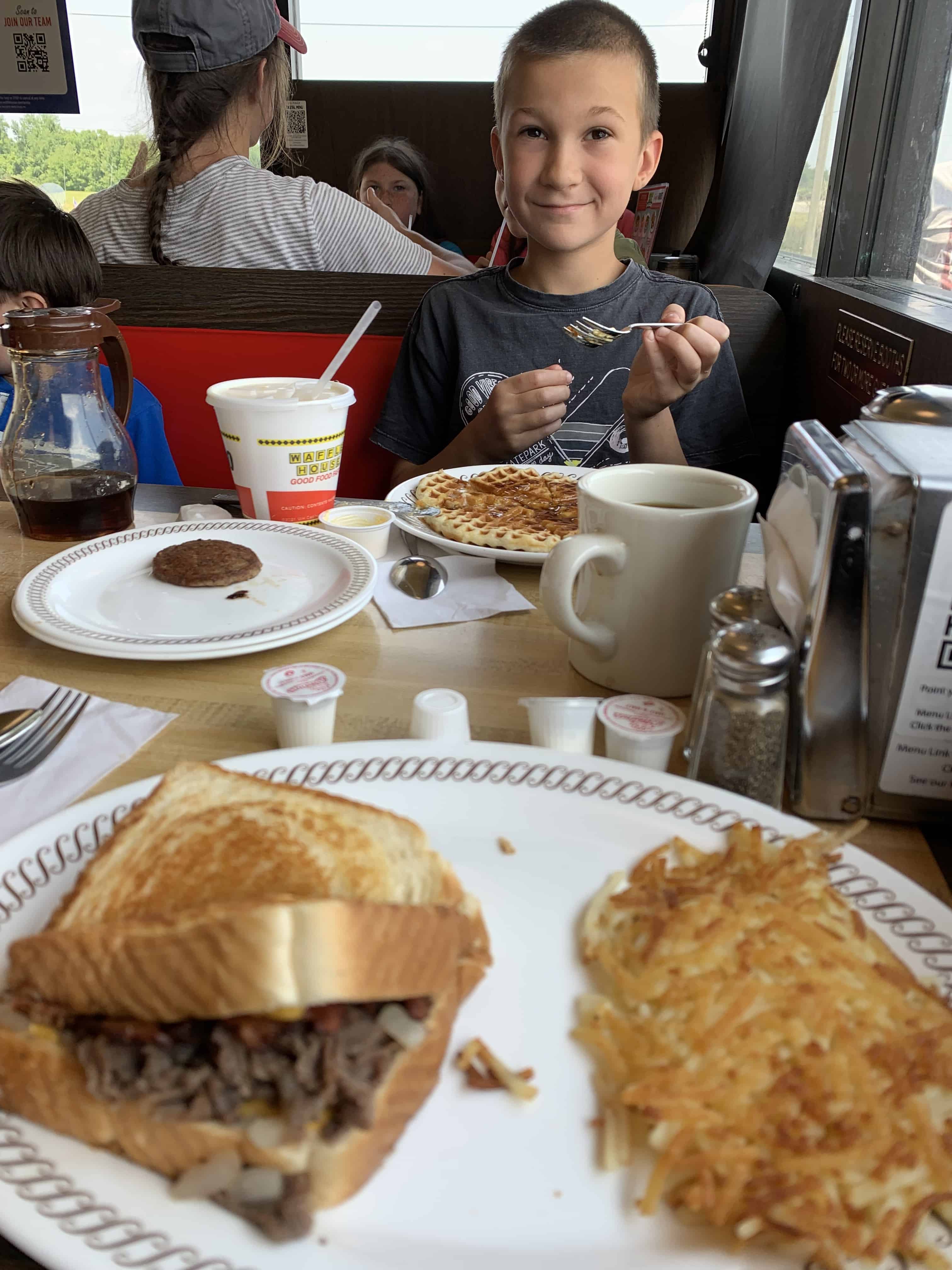 Boy enjoying waffle at Waffle House
