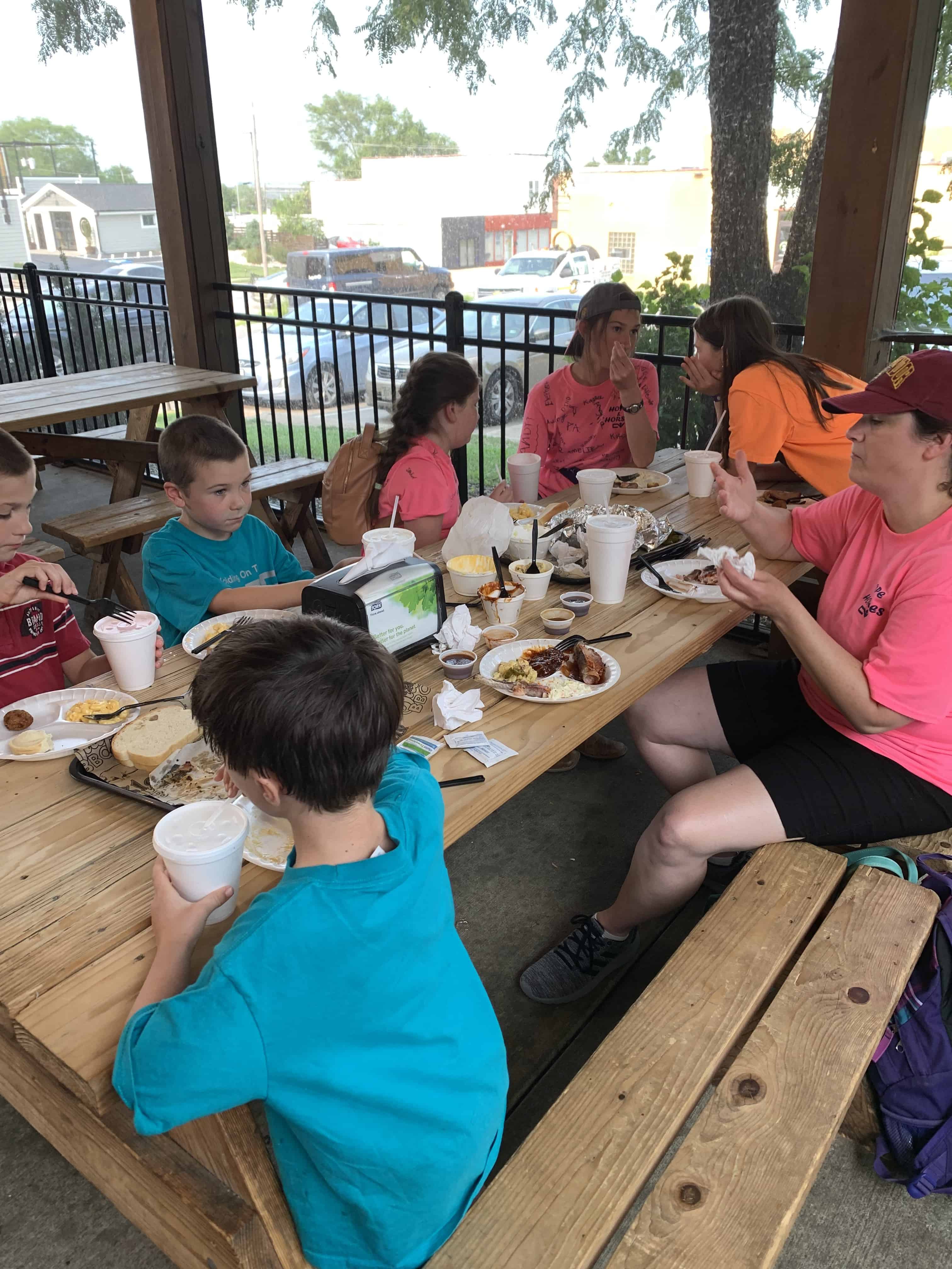 family eating at Slap's BBQ in Kansas City, KS