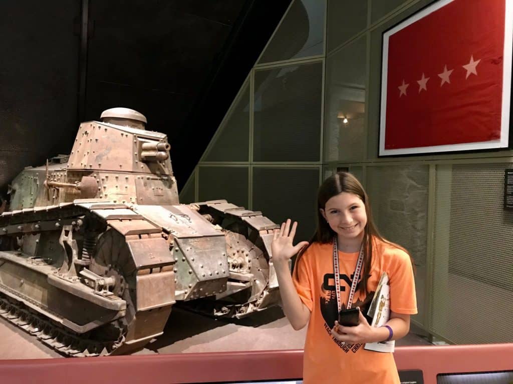 Girl in front of a real World War 1 tank