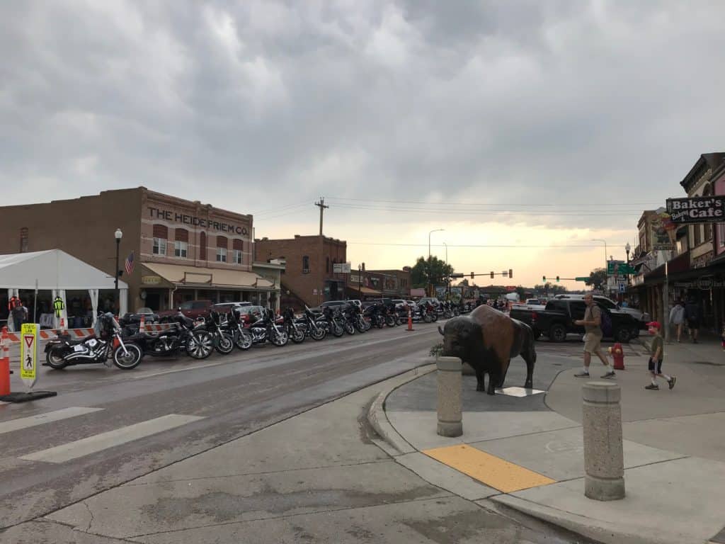Downtown Custer, SD with motorcycles lining one side of the street. 