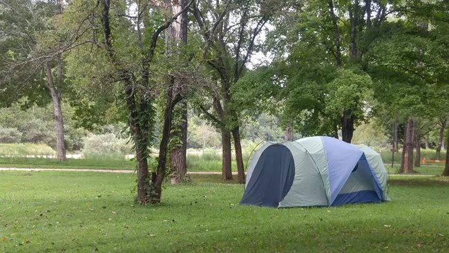 Tent camping at the Ozark National Scenic Riverways, most beautiful of the national parks in Missouri.
