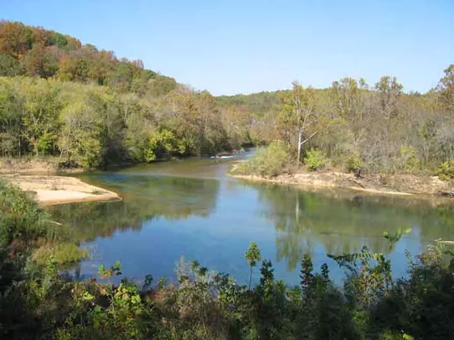 Forested hills surround the meeting place of the Current and Jack's Fork Rivers. The unique beauty of the Ozarks is one reason why we chose it as one of the top five National Parks in Missouri.