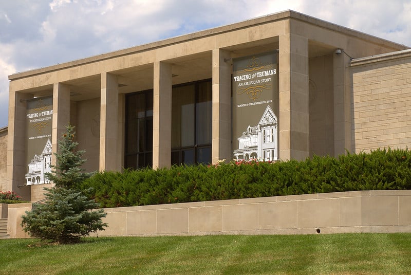 A modern, monumental entrance welcomes you to the Harry S. Truman Library and Museum. 