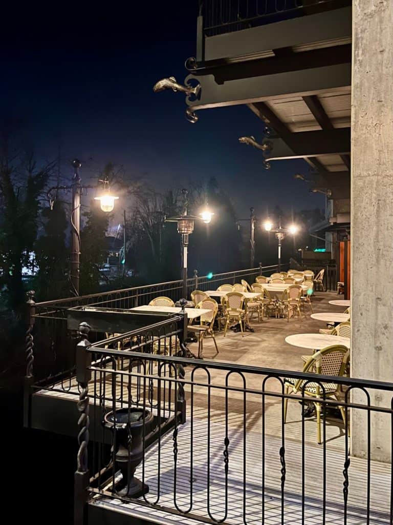 Nighttime view of the dining balcony at the Noble Fox.