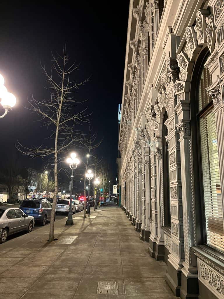 Street at night in downtown Salem, Oregon. Taproot is an earth-friendly restaurant in Salem.