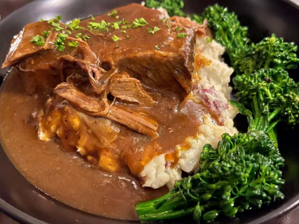 Brisket and blue cheese mashed potatoes with broccolini at the Magnolia Grill.