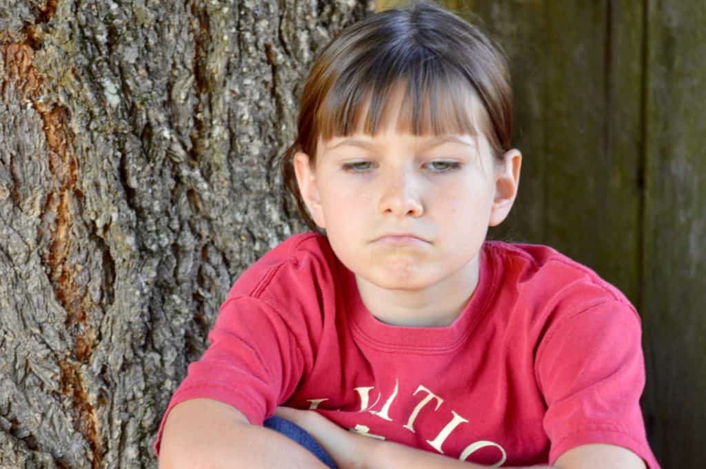 Girl anxious face. Anxiety can affect children as well as adults.