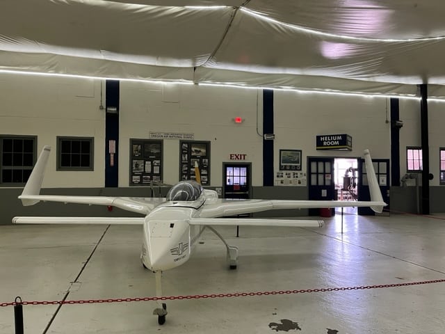 Small plane in front of the Helium room.