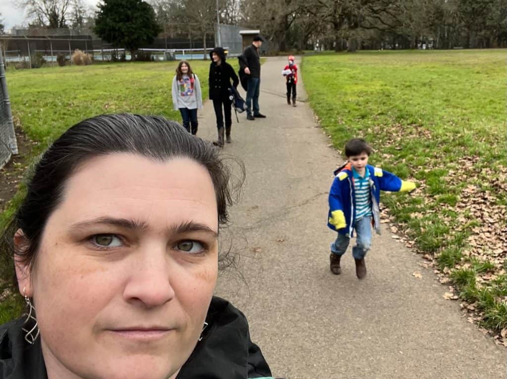 Family taking a walk. Taking a walk is one of the best self care ideas for anxiety.