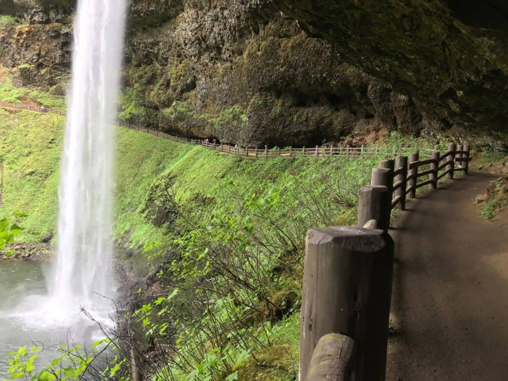 Hiking behind a waterfall is one of the unique experiences available at Silver Falls State Park.