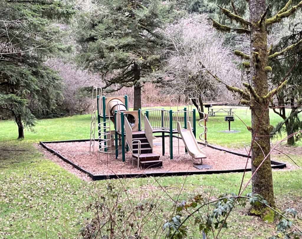 A playground and picnic areas welcome families to the South Falls Day-use area at Silver Falls State Park.