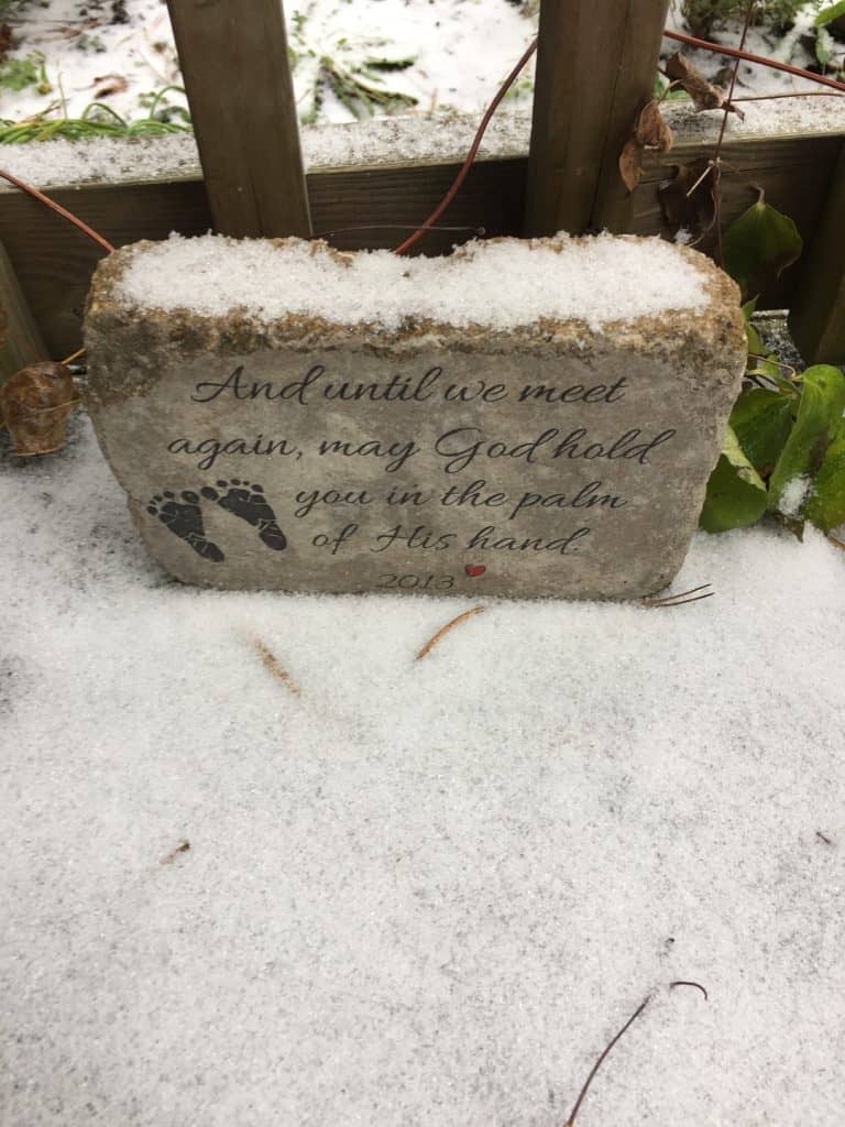 Memorial garden stone with script and baby footprints and date. Miscarriage gift box.