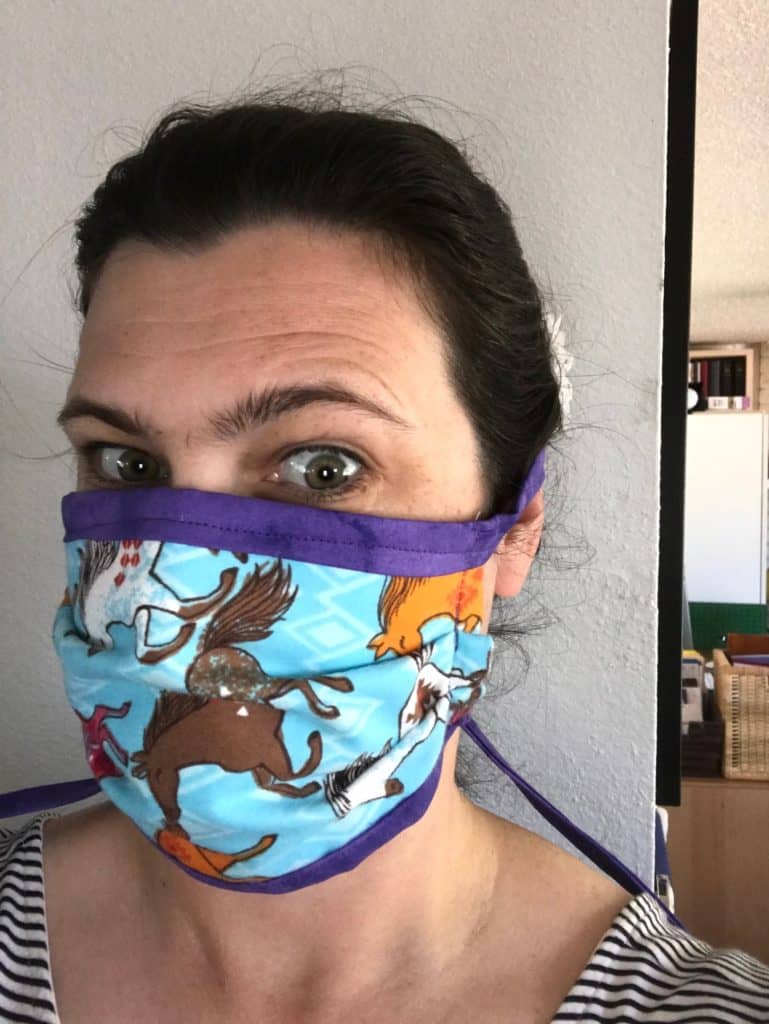 Woman wearing homemade face mask.
