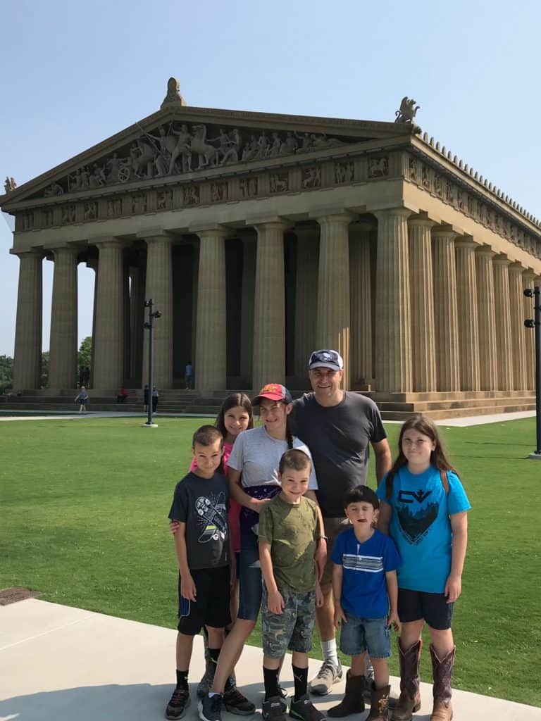 Family photo in front of the Nashville Parthenon.