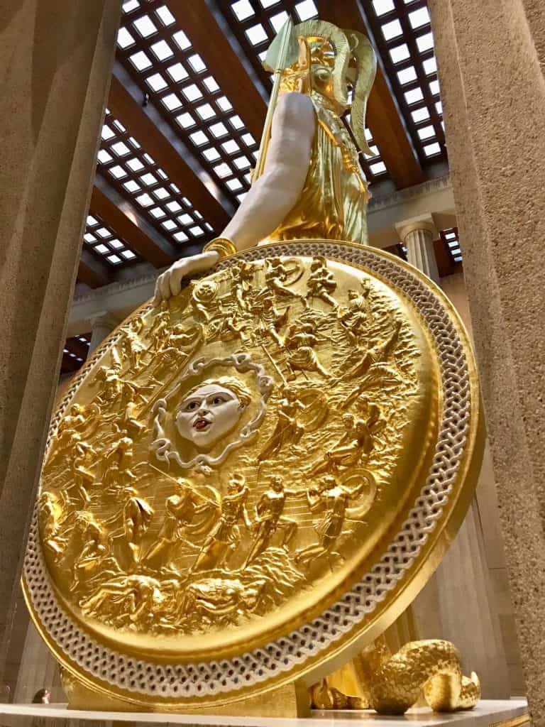 Shield of Athena Parthenos with battle scenes and Gryphon's head on it.