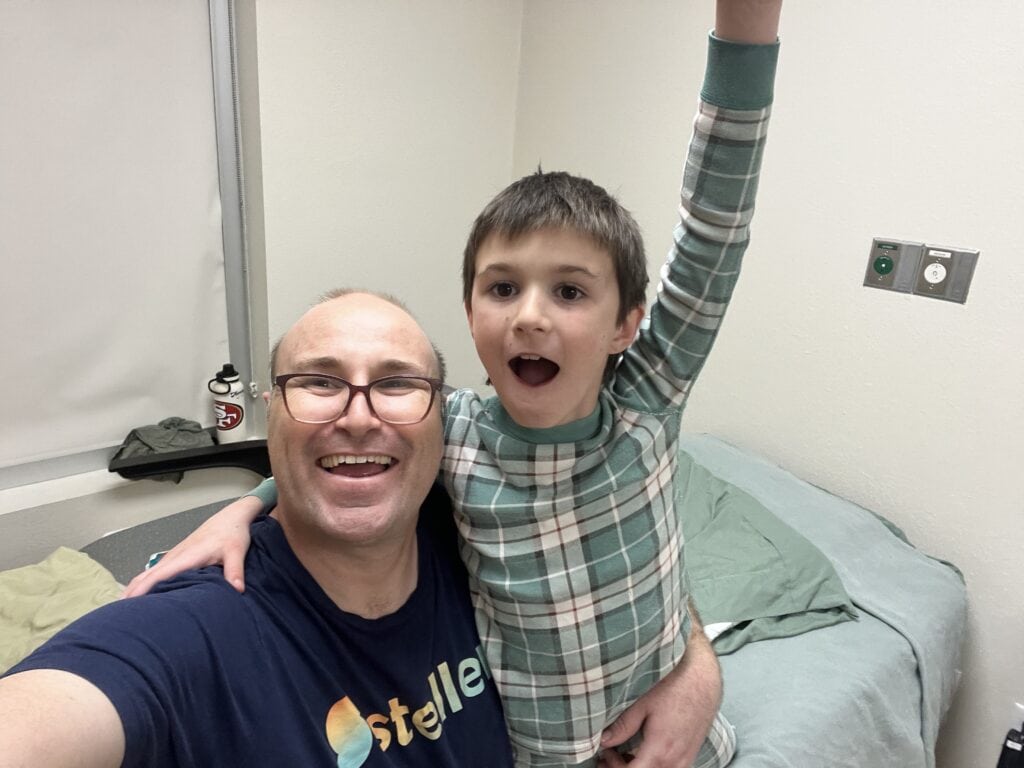 Brian helps our youngest son get ready for bed.