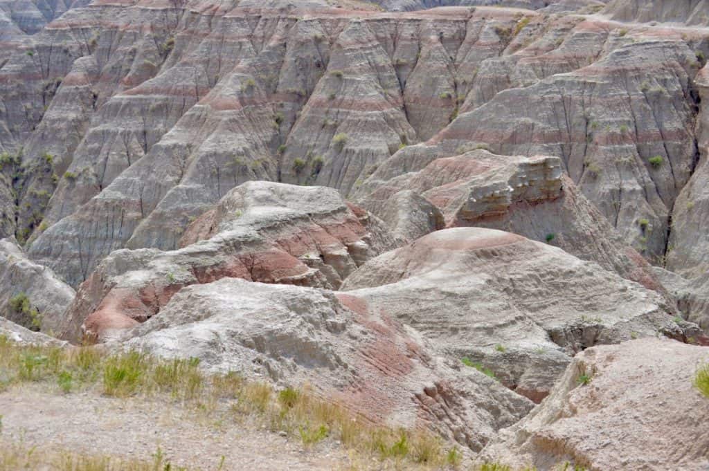 Paleosoils and different color gradations are easily seen from your vehicle while driving through Badlands National Park.
