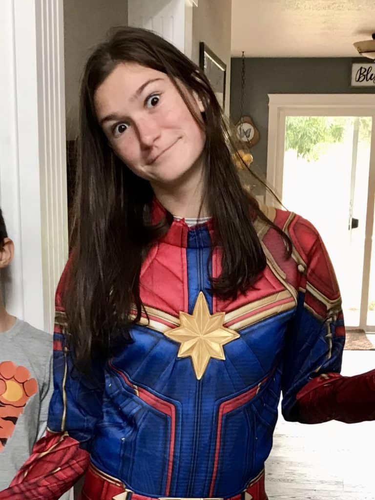 Girl in Captain Marvel Costume.