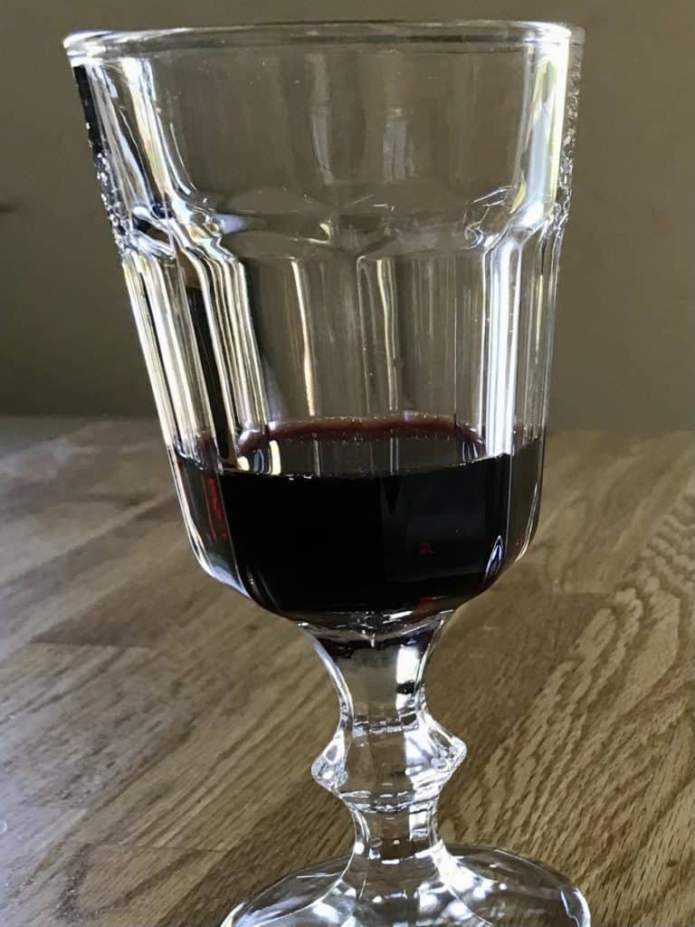 WIne in glass. Family activities near McMinnville include visiting a winery at the end of the day.