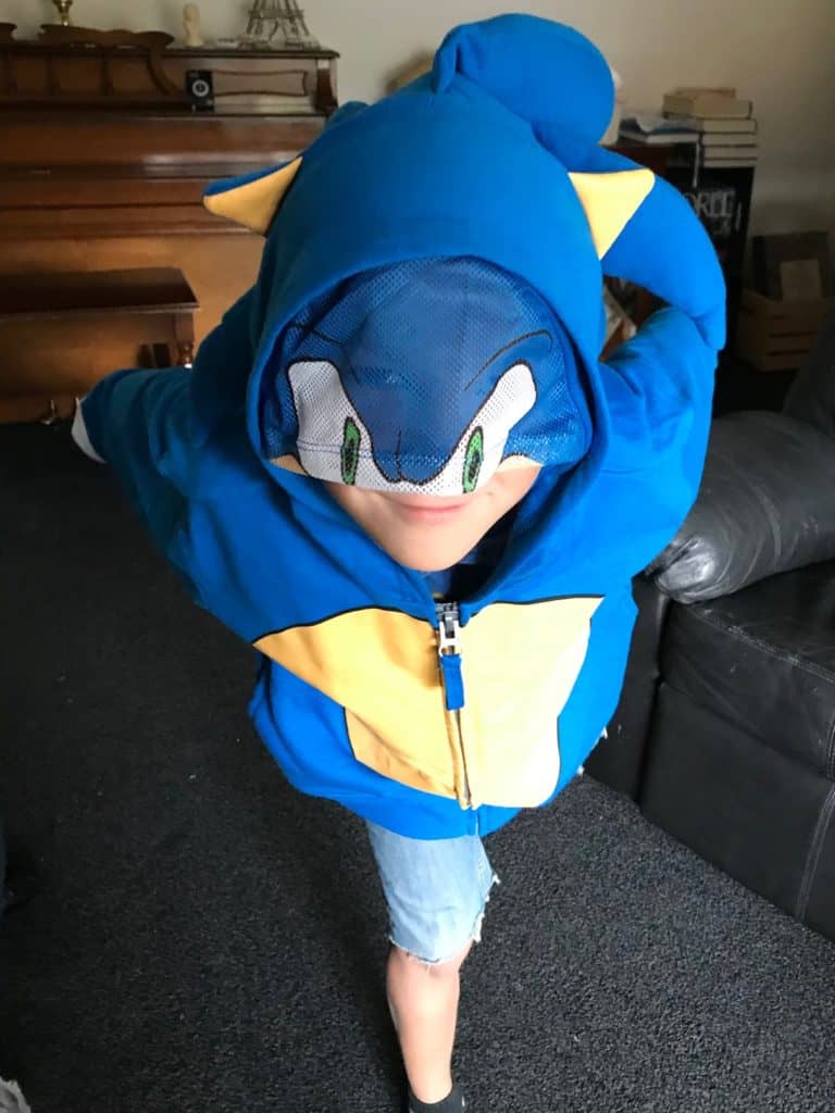 Boy wearing Sonic the Hedgehog hoodie. Kids clothing organization ideas.