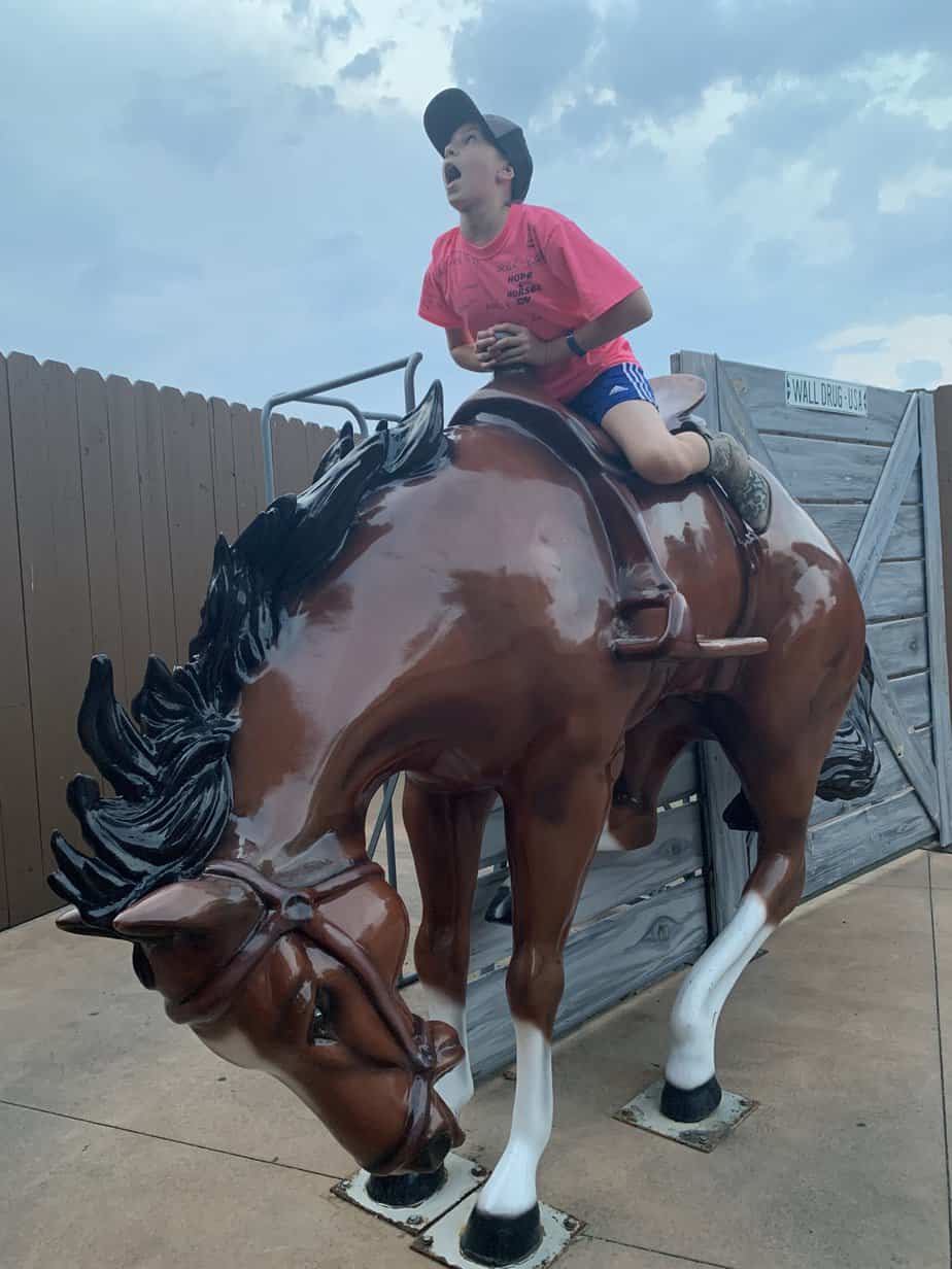 Girl on Bucking Bronco.