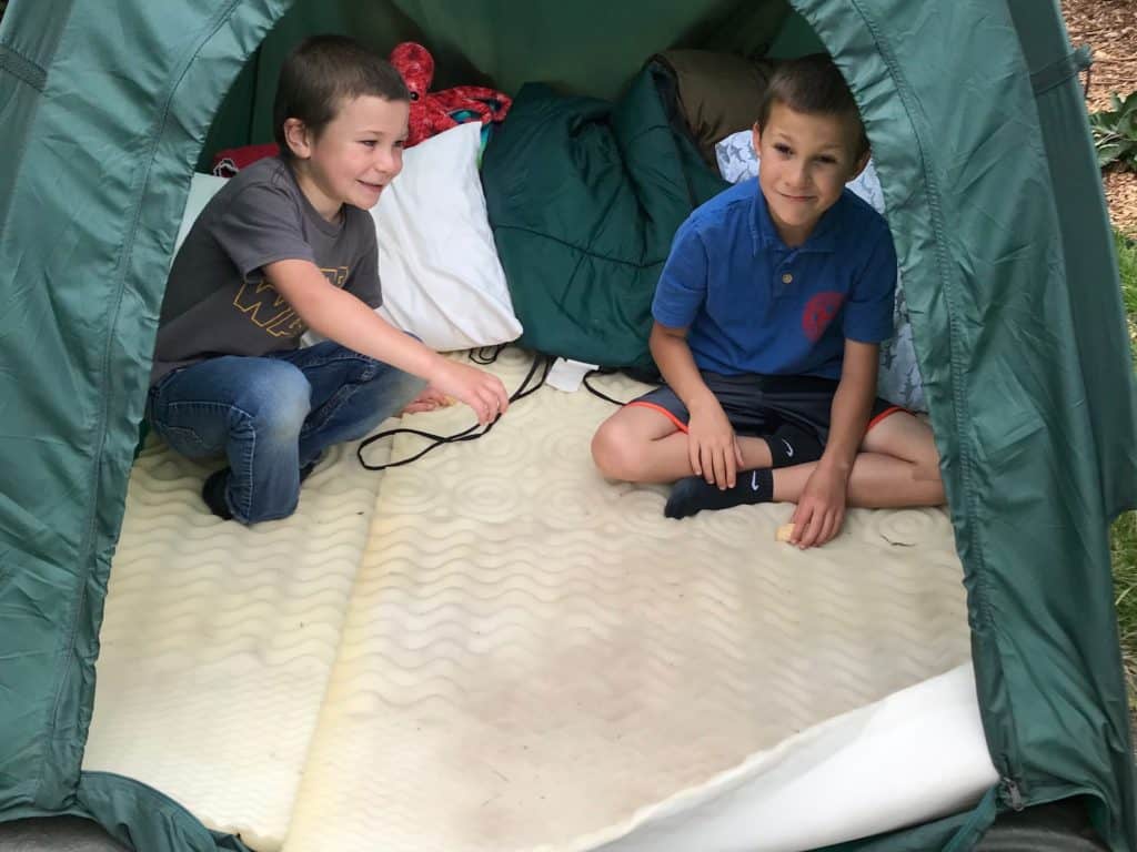 Boys in tent. Camping ideas for families.