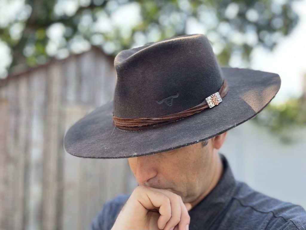 A picture of me wearing a felt western hat by Bullhide. Felt cowboy hats are some of the best cowboy gifts for him.