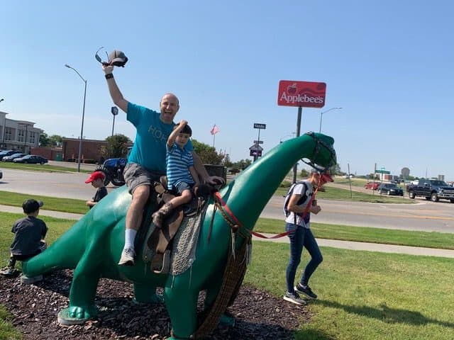 My four year old and I ride a Sinclair dinosaur in North Platte, Nebraska. cowboy gifts for men.