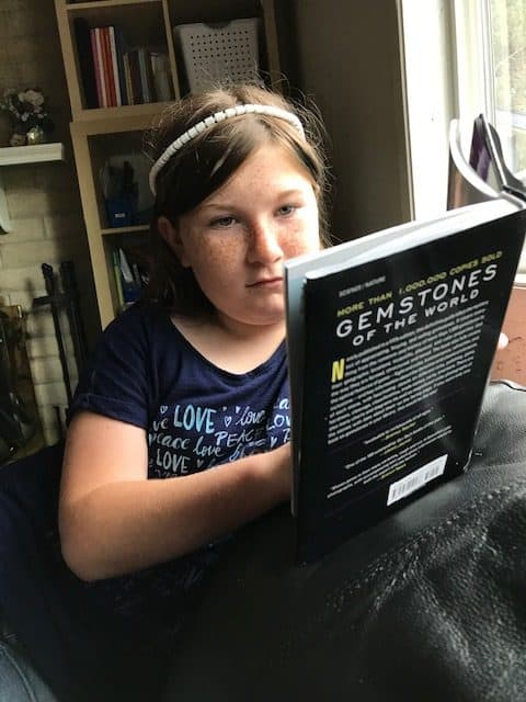 My daughter reads a book about gemstones of the world. Good information leads to success in rockhounding.