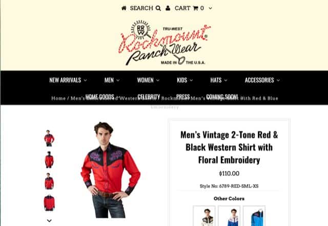 A screenshot of a loud cowboy shirt sold by Rockmount Ranchwear. The bright red, collared shirt also have black shoulders and black cuff with rich embroidery. cowboy gifts for men